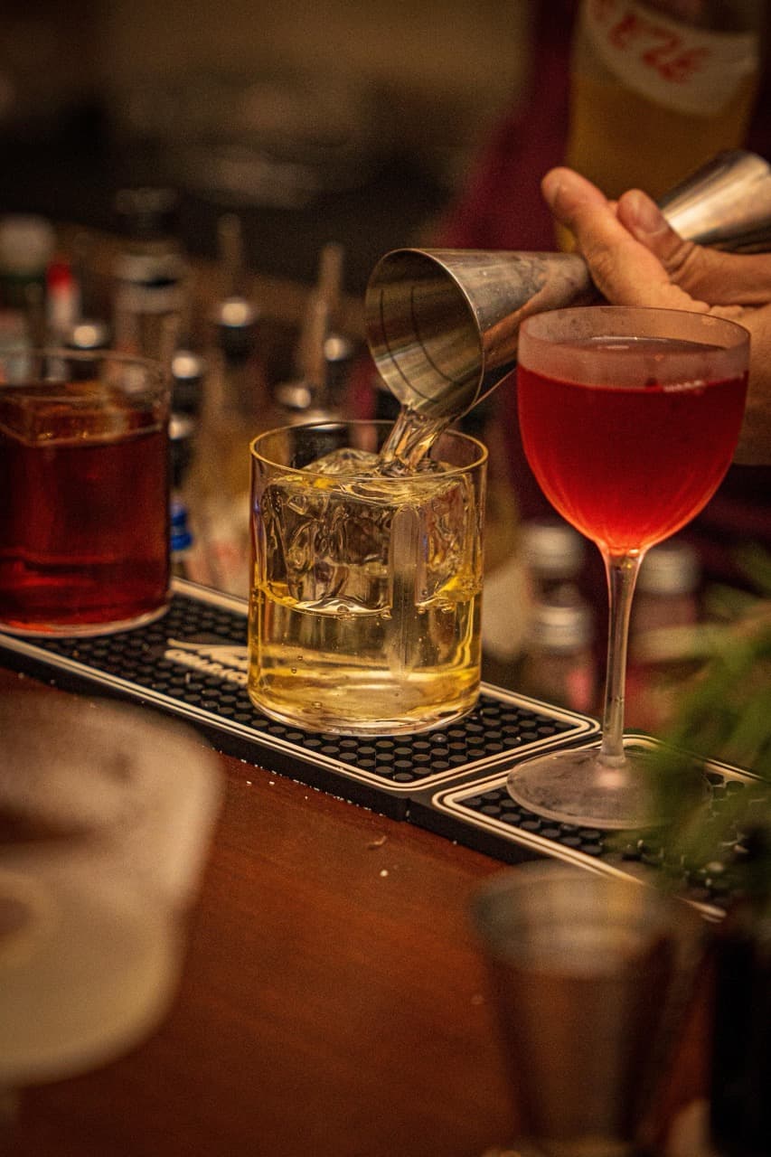 Signature cocktail creation at The Apothecary Cocktail Bar